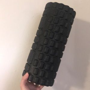 Massaging foam roller